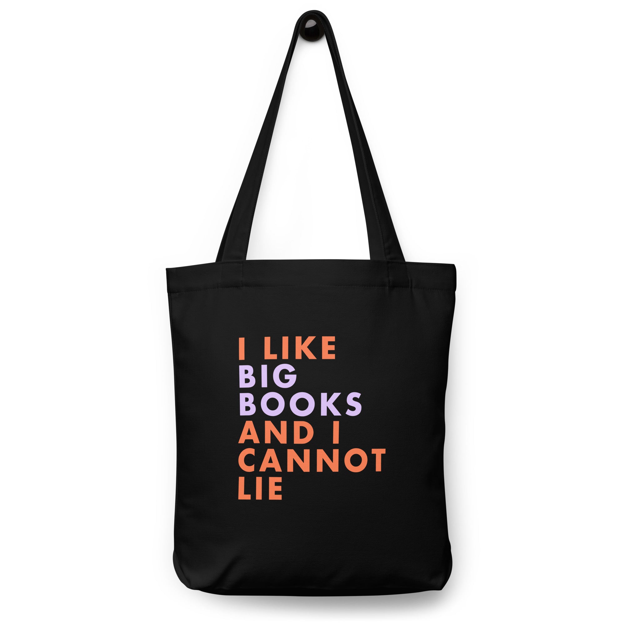 Black tote bag with colorful text 'I LIKE BIG BOOKS AND I CANNOT LIE' on a white background